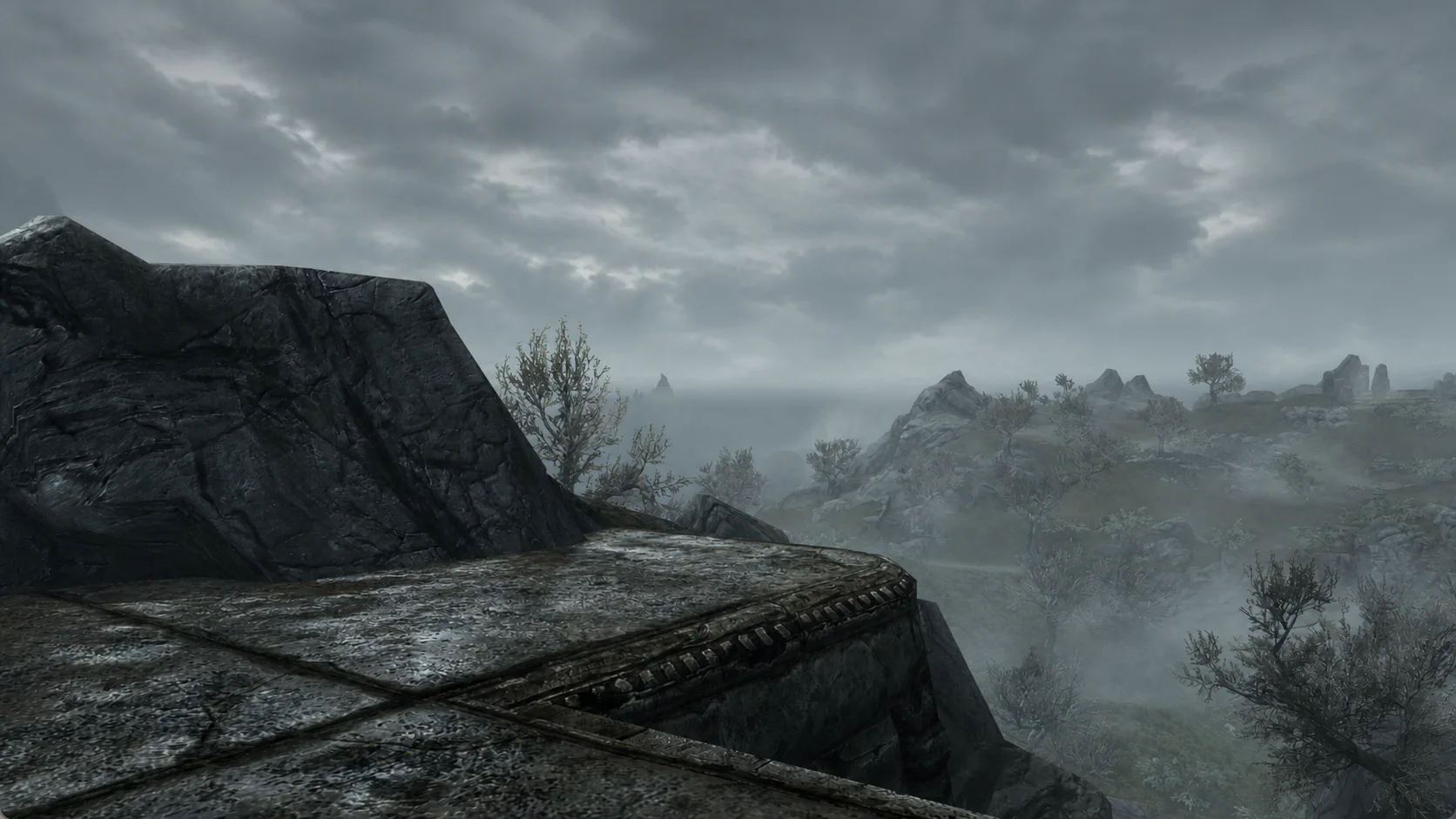 An overcast view across the rugged hills surrounding Arkngthamz