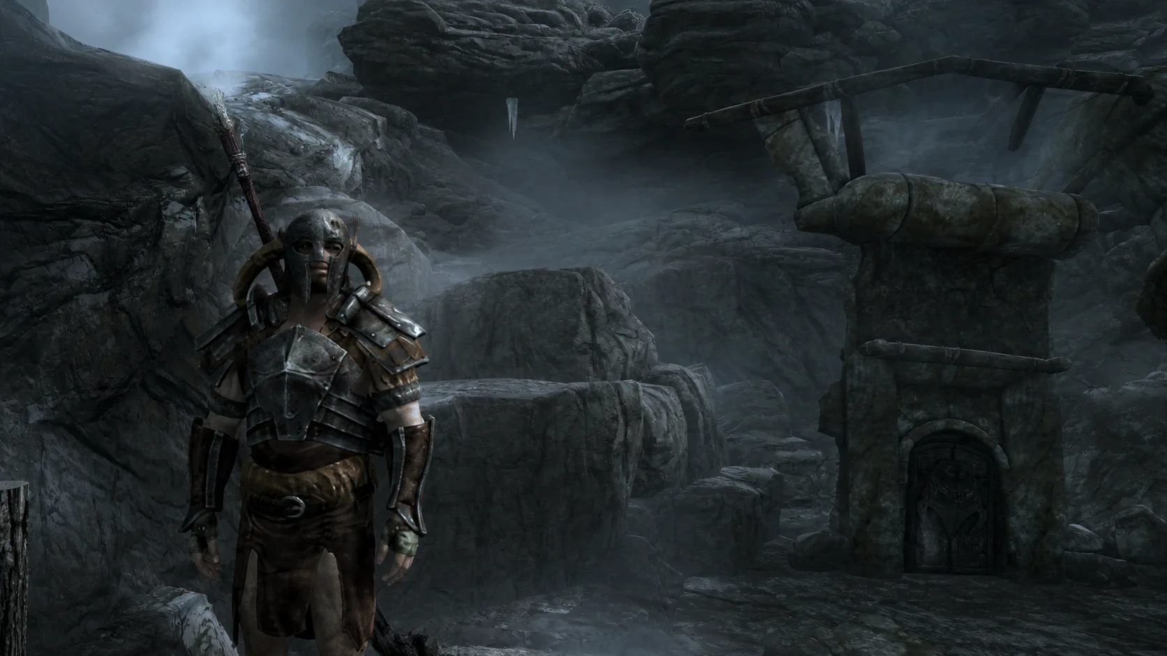 The Last Atmoran standing watch beside the frost-dark entrance of an ancient Nordic ruin