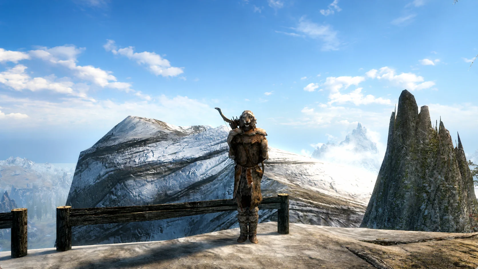 The hunter watching the snowy ranges from the high overlook at Angi's Camp