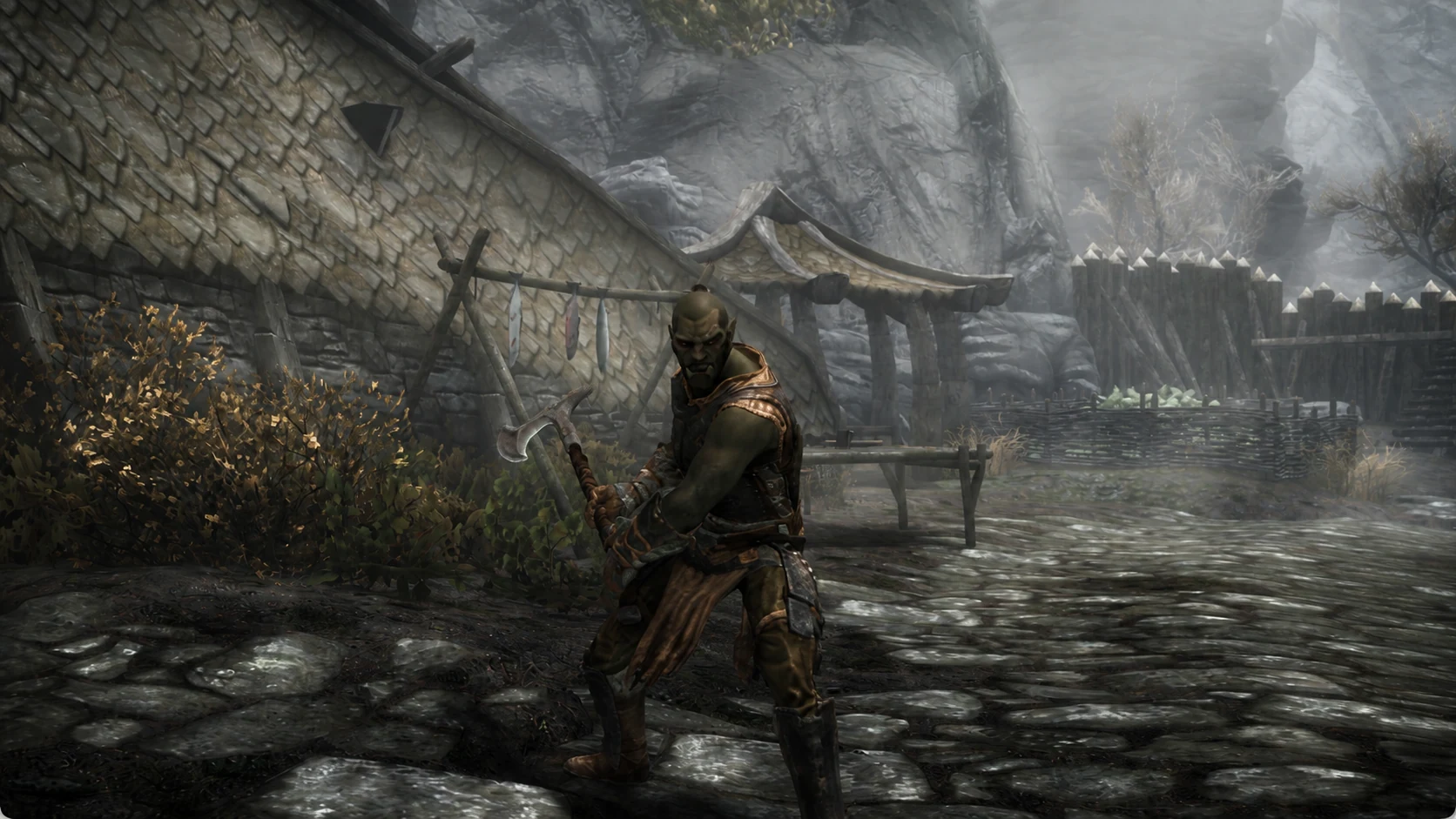 The Stronghold Smith holding a battleaxe in the yard at Mor Khazgur