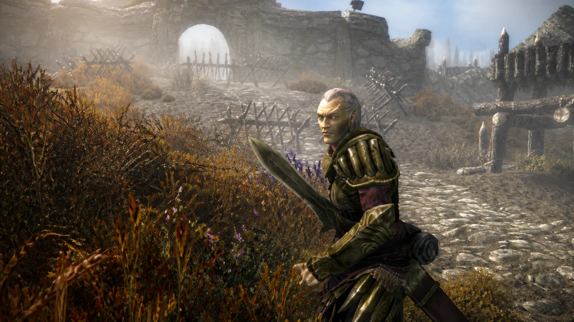 The Justiciar drawing an Elven sword in Elven Hunter armor outside Fort Greymoor