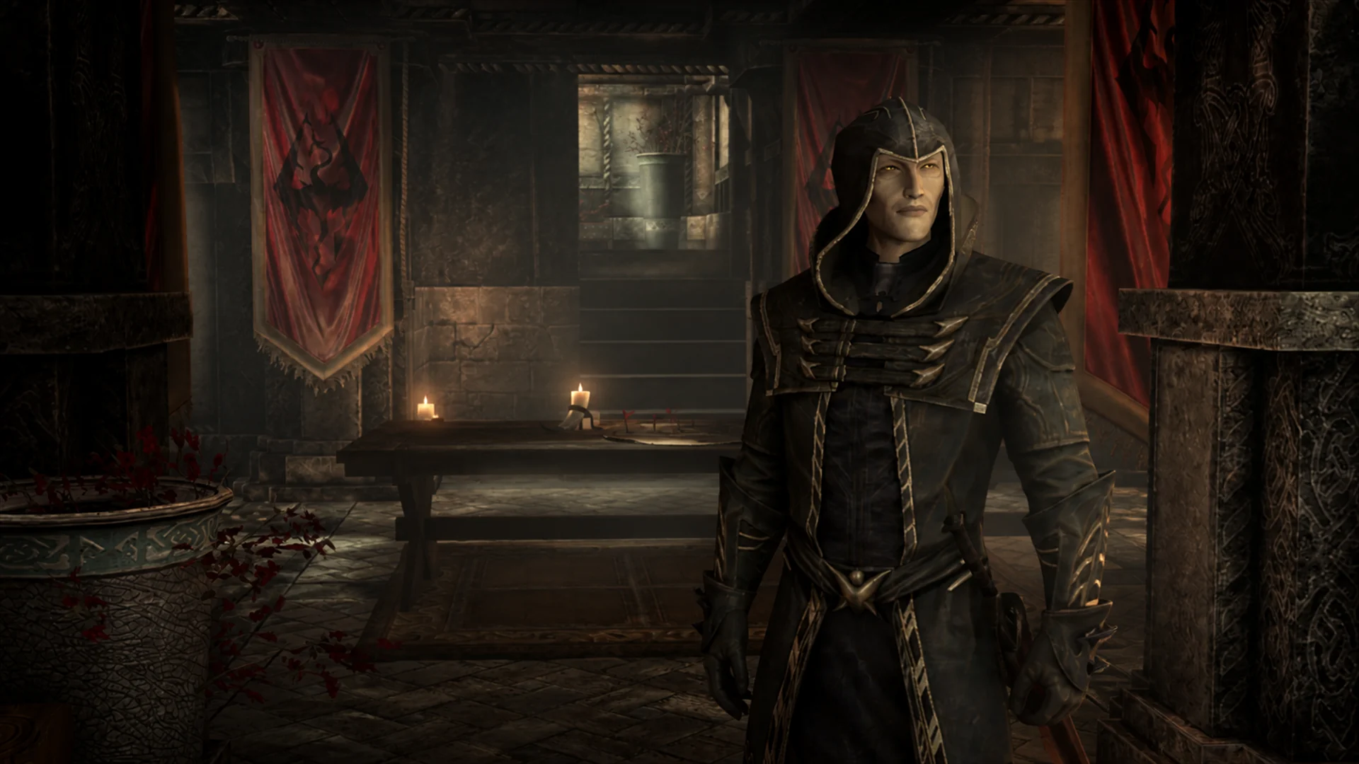 The hooded Thalmor Justiciar standing beside the campaign table in an Imperial command room