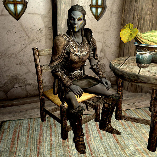 Jenassa seated inside the Drunken Huntsman in Whiterun