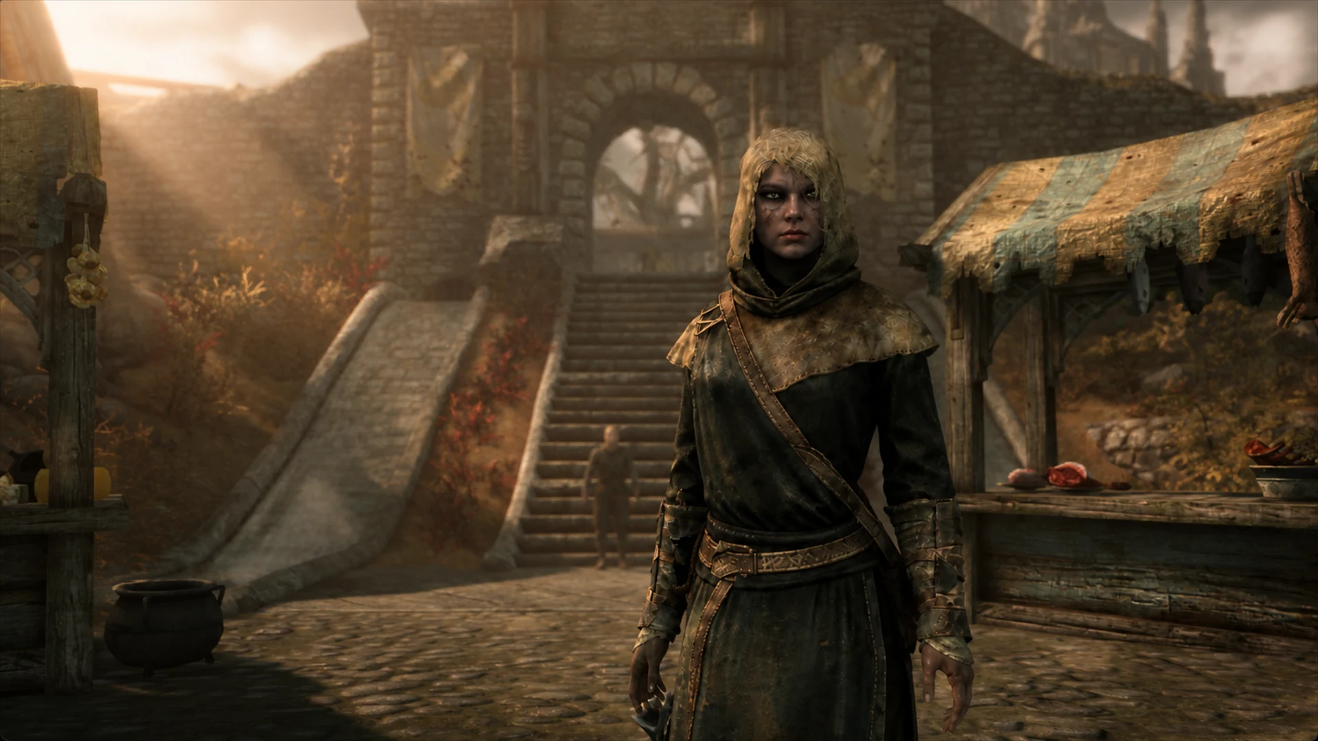 A novice Breton Vigilant standing between the market stalls beneath the gate in Whiterun
