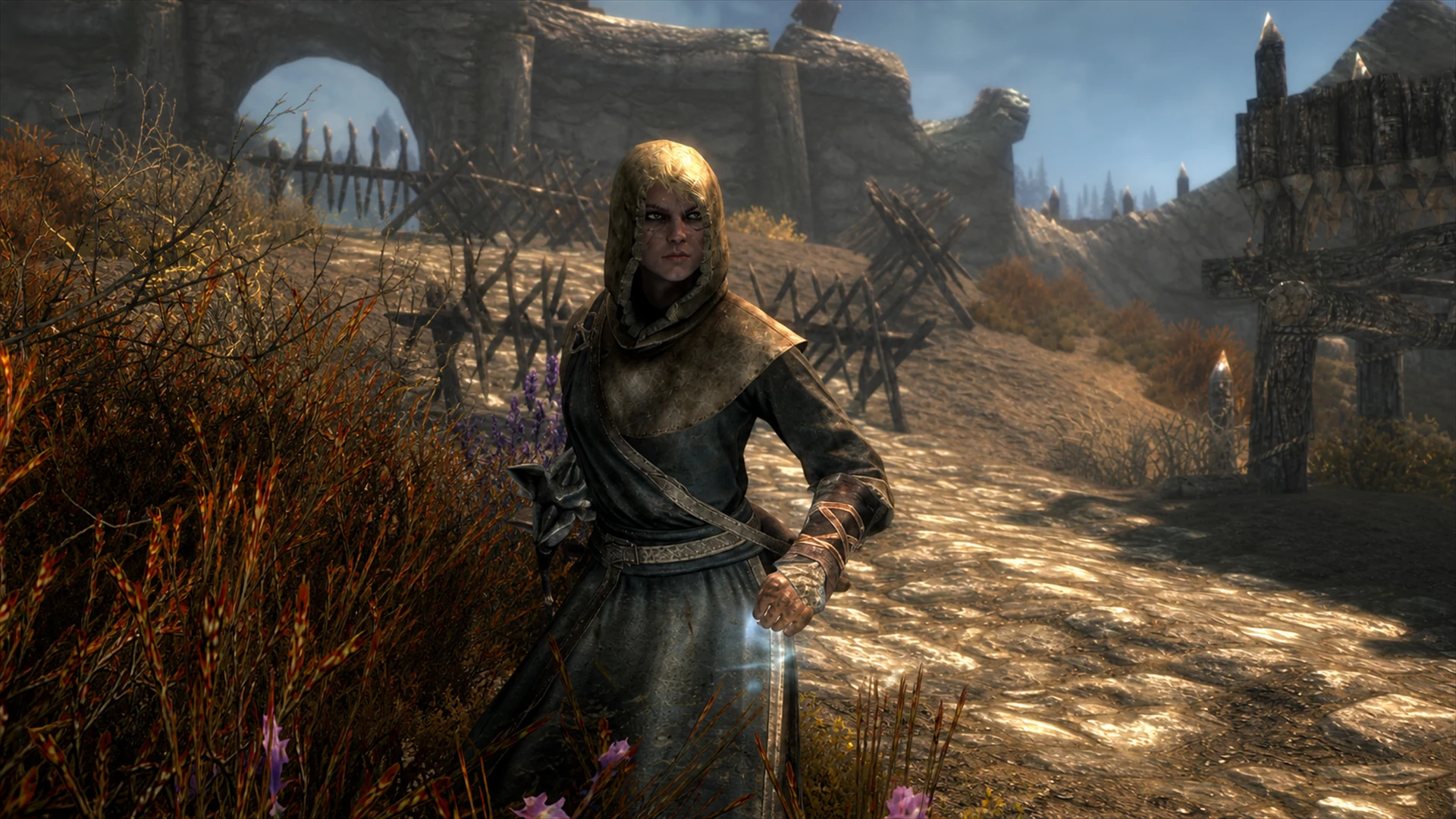 A novice Breton Vigilant holding a weapon-ready stance on the fortified road below Fort Greymoor