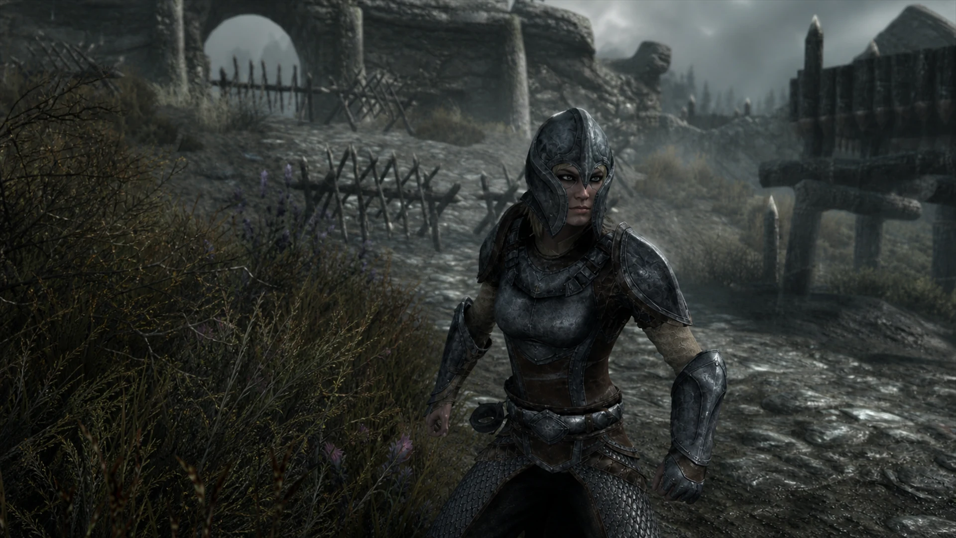 A Breton Vigilant in complete engraved armor moving into a weapon-ready stance outside Fort Greymoor