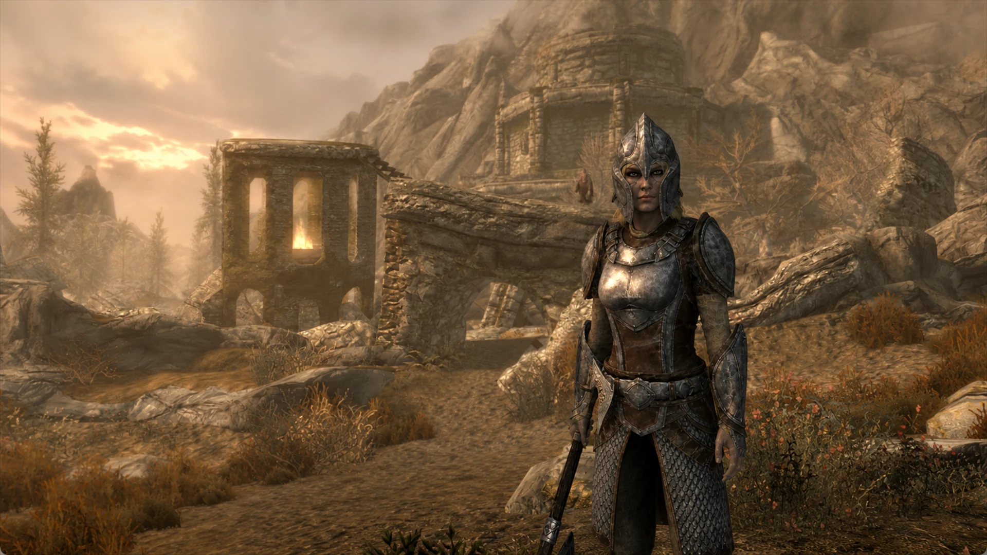 An armored Vigil Veteran standing before the ruined towers and arcane fire of Fellglow Keep at sunset