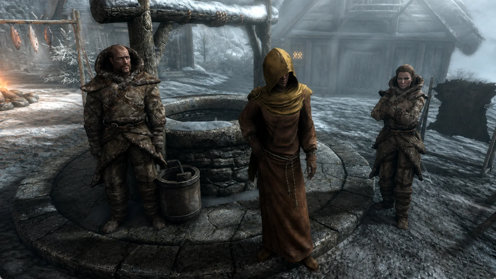 The hooded pilgrim standing among Skaal keepers beside the village well in winter